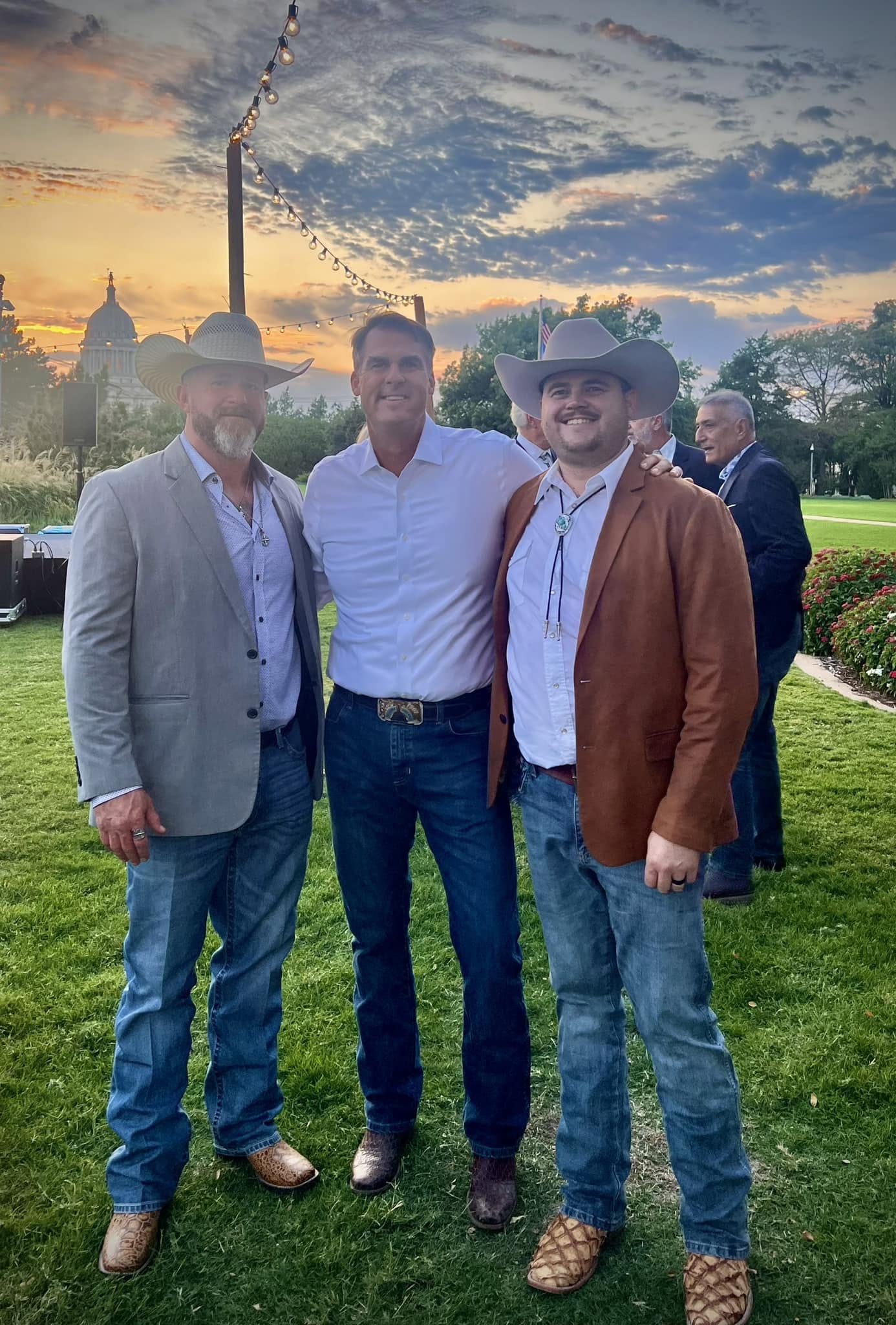 Ean and Jared two founders taking a picture with the Mayor at a event.