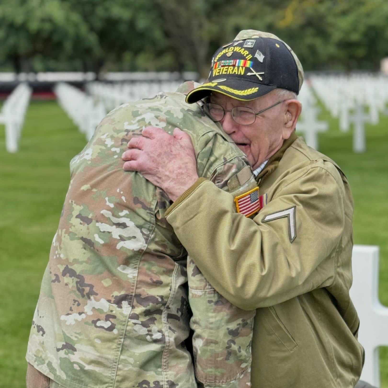 Two vets hugging each other.